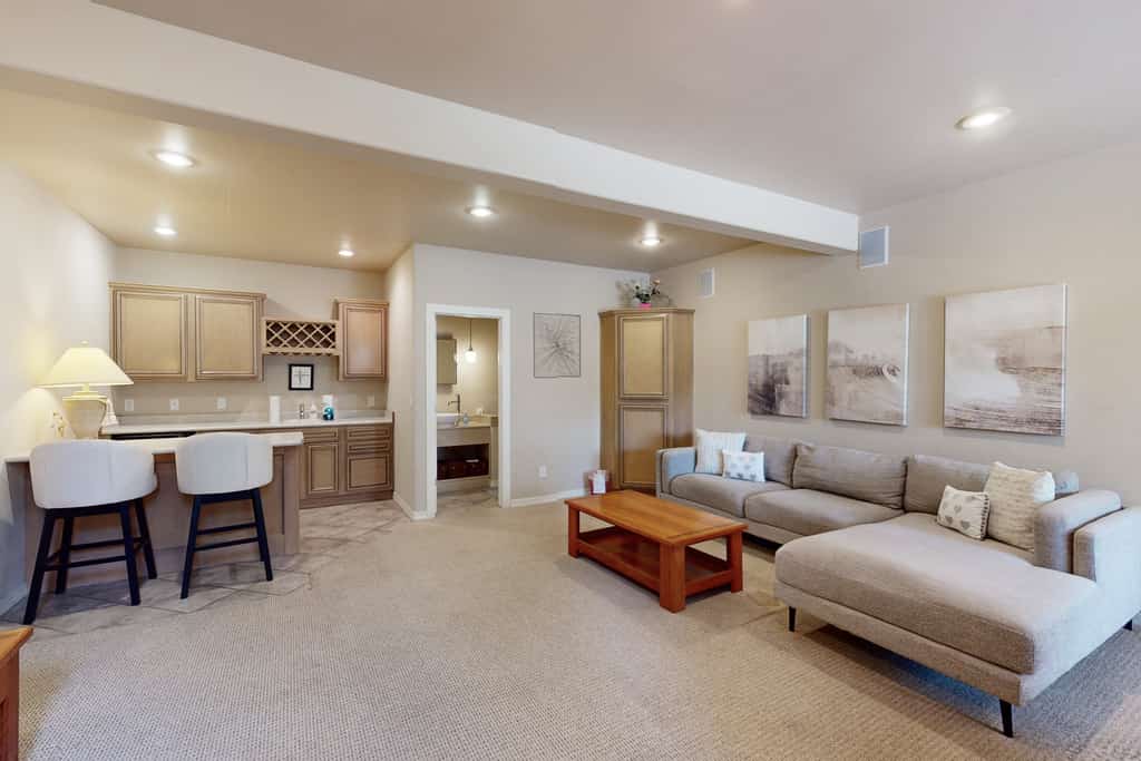 Lavish home with dual living areas & golf course views near skiing and dining