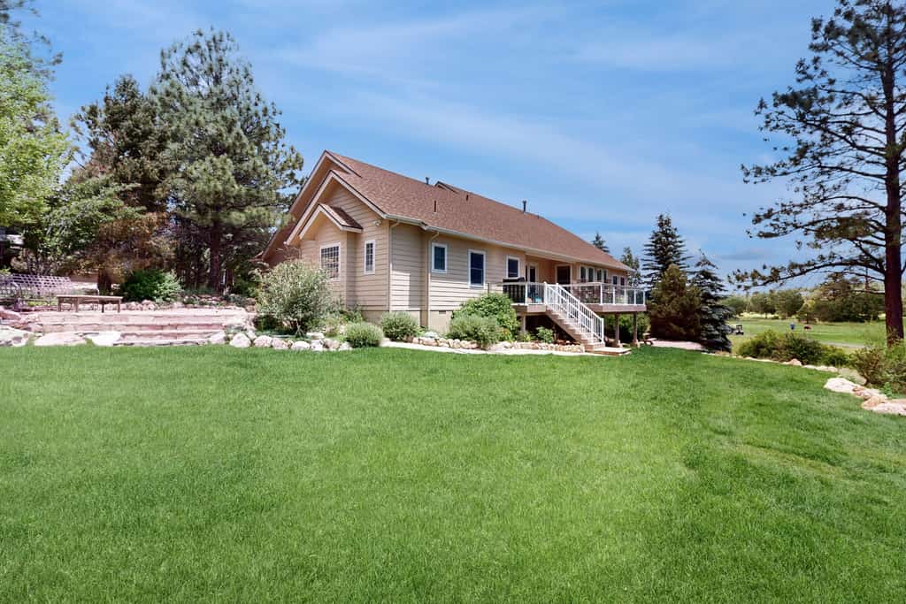 Lavish home with dual living areas & golf course views near skiing and dining