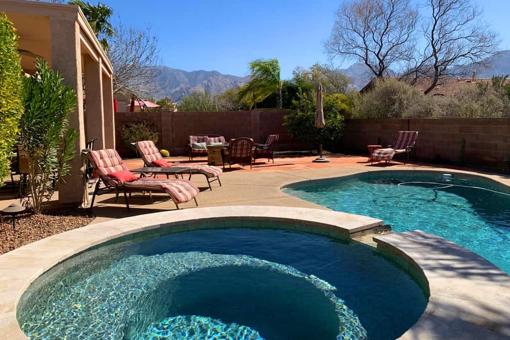 Contemporary & comfortable home with a pool, WiFi, washer/dryer & central air-conditioning