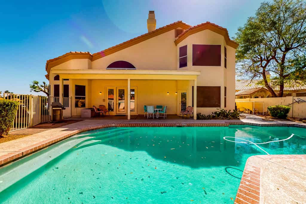 Lakefront home with private pool, kayak, cornhole, & pool table