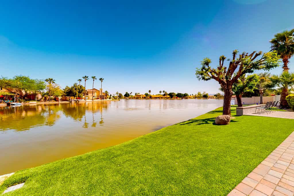 Lakefront home with private pool, kayak, cornhole, & pool table