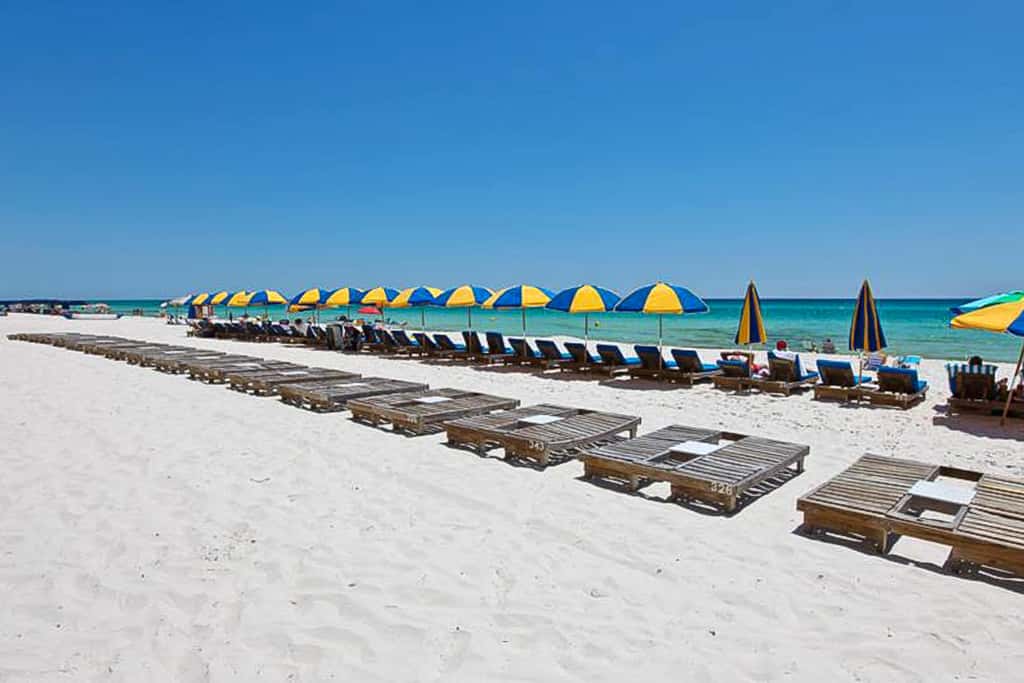 Gulf Front condo with Pools, Beach access and Gym