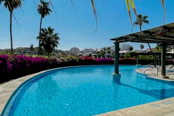 Experience unmatched luxury and privacy in our two-bedroom condo, and enjoy the incredible amenities of Peninsula
• One king-size bed and one queen-size bed
• Palapa with outdoor seating and lounge area
• Surrounded by the Vidanta Golf Course
• Beach towels, beach chairs, cooler bag, and umbrella
• Fast Wi-Fi and smart TV in each room
• Fully equipped kitchen
• Located two blocks from the Malecon, beach, shopping, and restaurants
• Security gate and parking