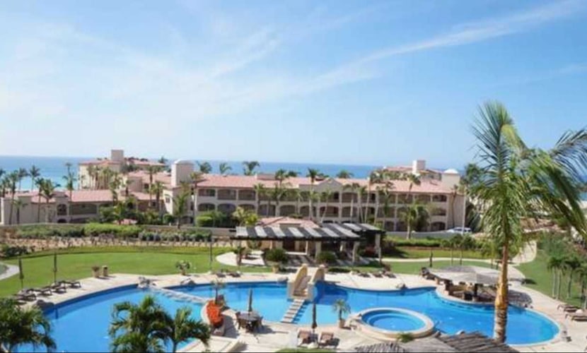 Is a beautifully maintained condo in Las Mañanitas located the ground level, featuring a fully equipped kitchen with granite countertops and stainless steel appliances, a spacious bedroom, and a bathroom with natural stone finishes and a walk-in shower.
