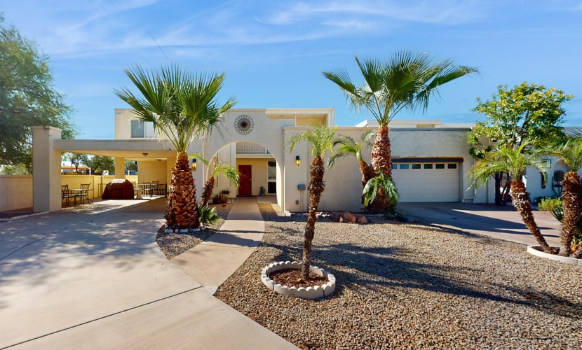 Spacious townhome with movie room, patios, pool, & home office