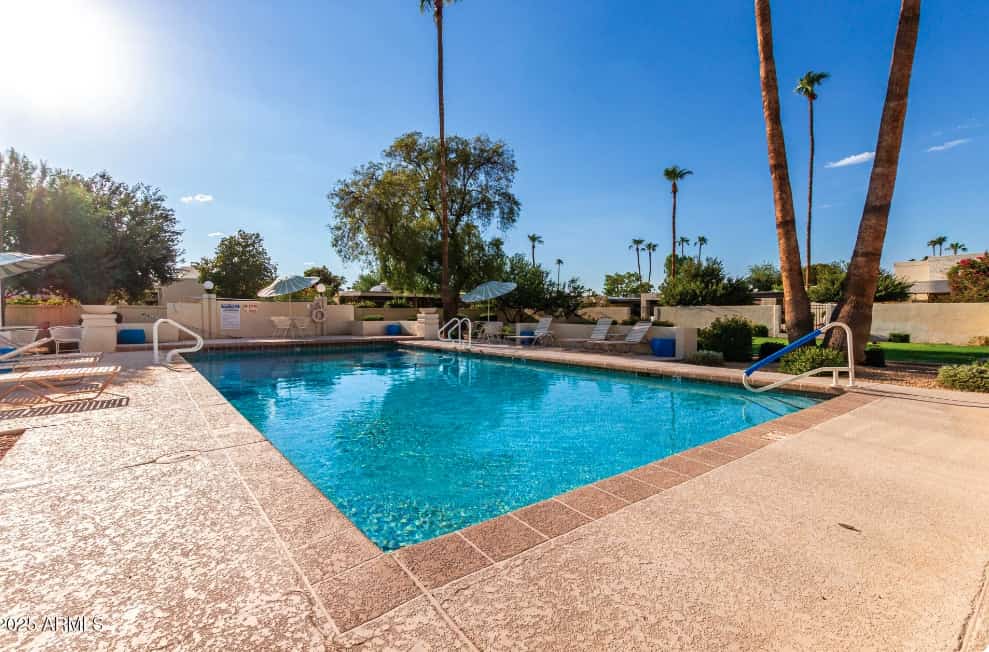 Spacious townhome with movie room, patios, pool, & home office