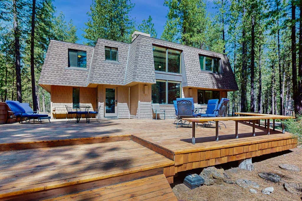 Dog-friendly cabin with pool, sauna, private hot tub, & great deck