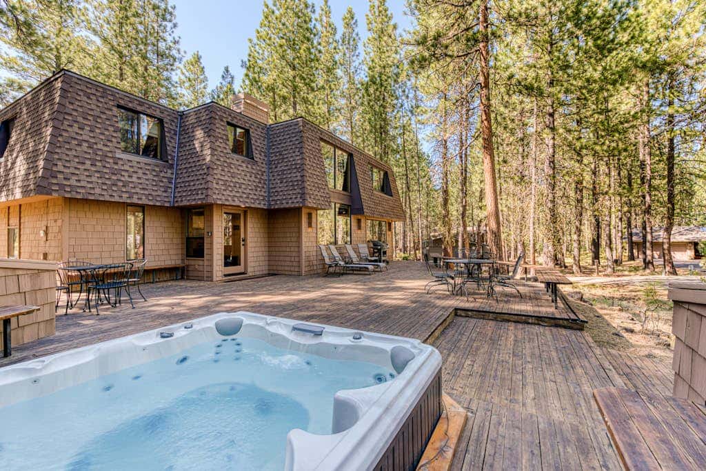 Dog-friendly cabin with pool, sauna, private hot tub, & great deck