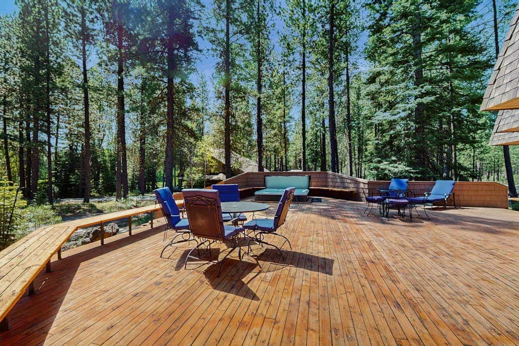 Dog-friendly cabin with pool, sauna, private hot tub, & great deck