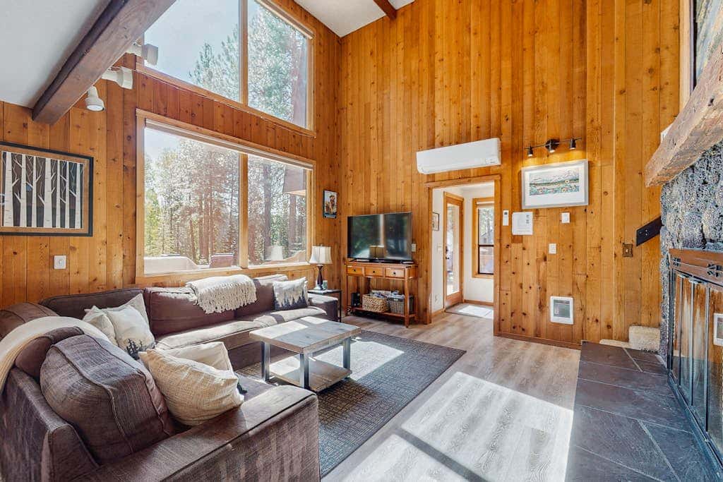 Dog-friendly cabin with pool, sauna, private hot tub, & great deck