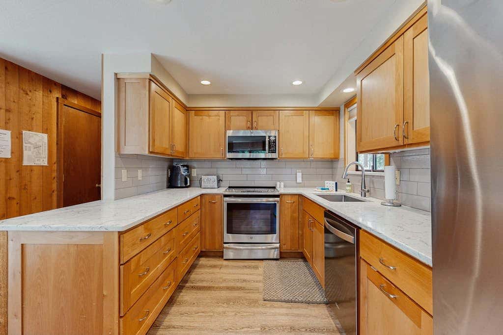 Dog-friendly cabin with pool, sauna, private hot tub, & great deck