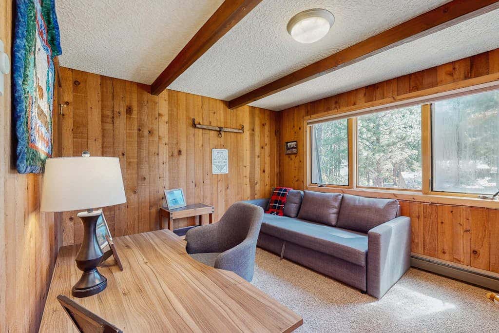 Dog-friendly cabin with pool, sauna, private hot tub, & great deck
