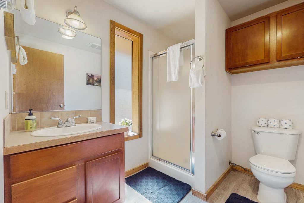 Dog-friendly cabin with pool, sauna, private hot tub, & great deck