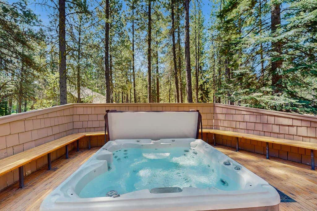 Dog-friendly cabin with pool, sauna, private hot tub, & great deck