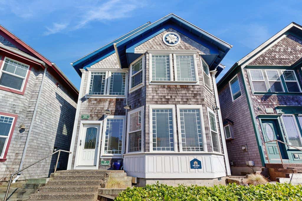 Ocean-view home with private hot tub, fireplace & grill - walk to beach