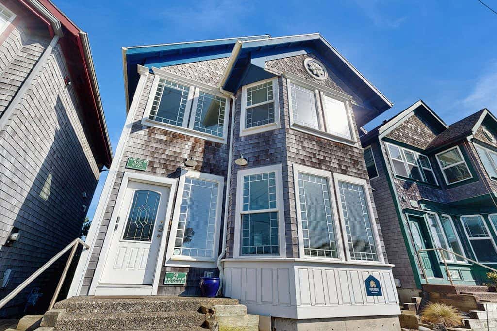 Ocean-view home with private hot tub, fireplace & grill - walk to beach