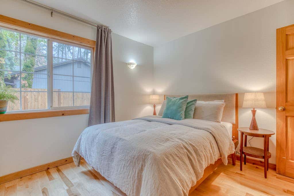 Dog-friendly cabin with deck, fenced yard, game room, & hot tub
