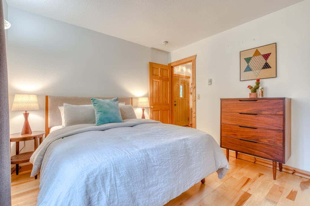 Dog-friendly cabin with deck, fenced yard, game room, & hot tub
