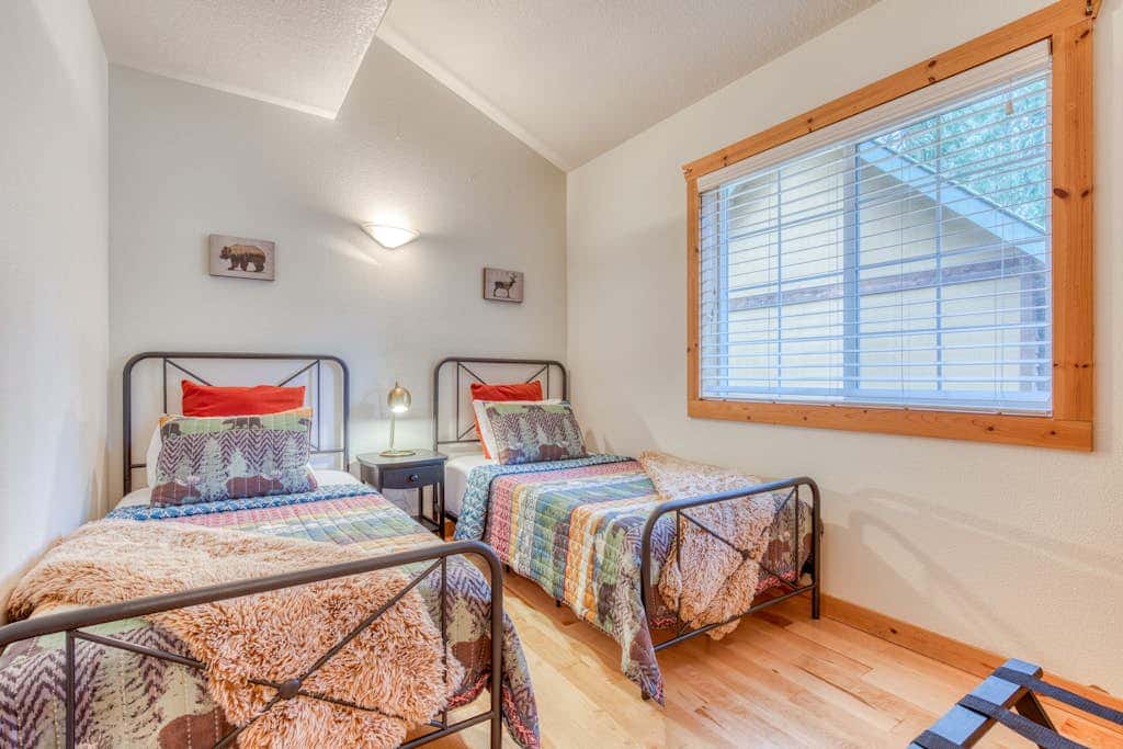 Dog-friendly cabin with deck, fenced yard, game room, & hot tub