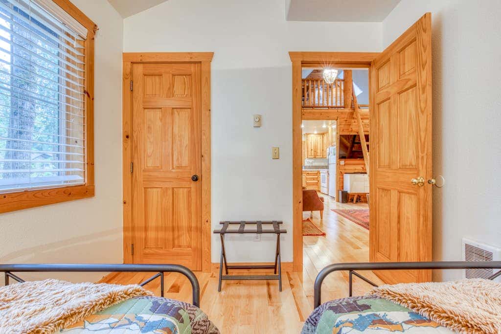 Dog-friendly cabin with deck, fenced yard, game room, & hot tub