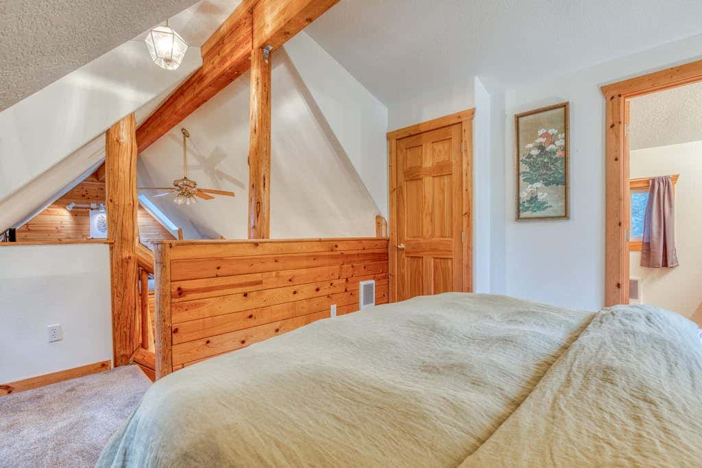 Dog-friendly cabin with deck, fenced yard, game room, & hot tub