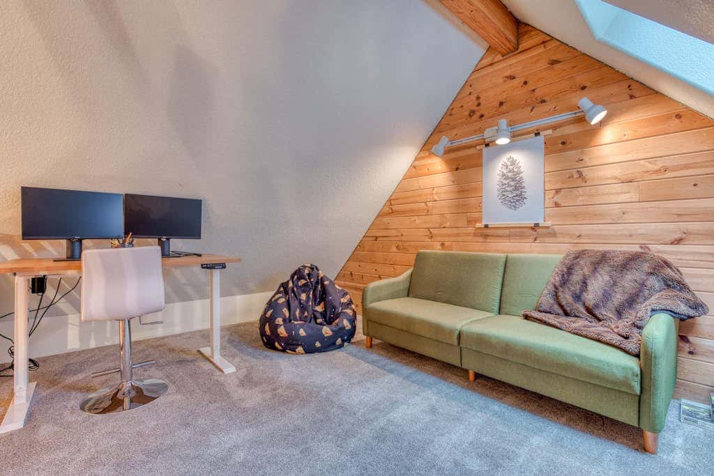 Dog-friendly cabin with deck, fenced yard, game room, & hot tub