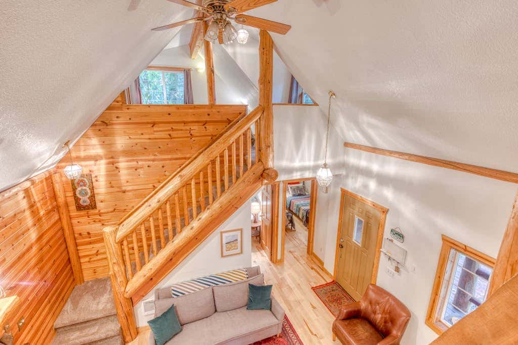 Dog-friendly cabin with deck, fenced yard, game room, & hot tub