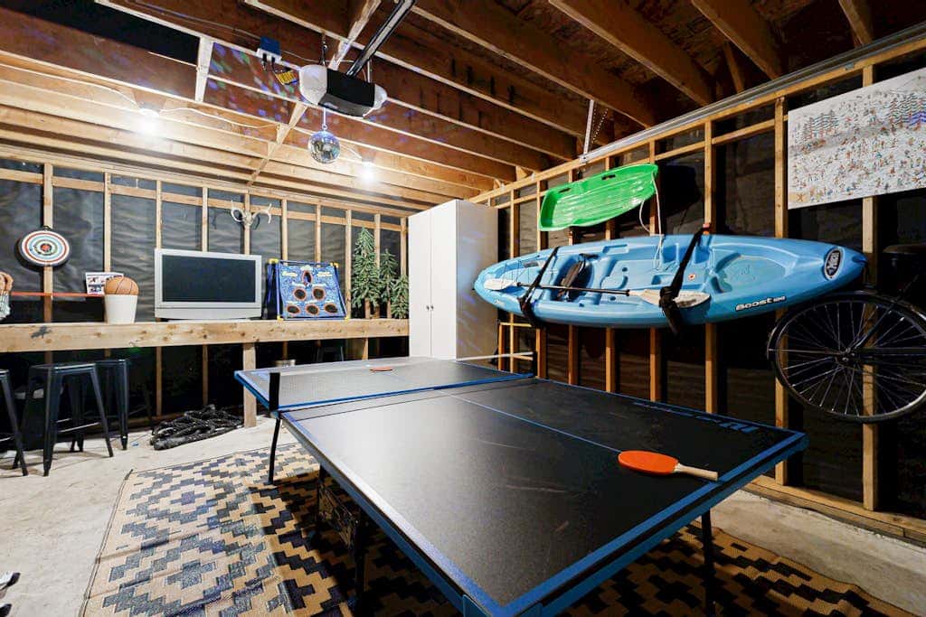 Dog-friendly cabin with deck, fenced yard, game room, & hot tub