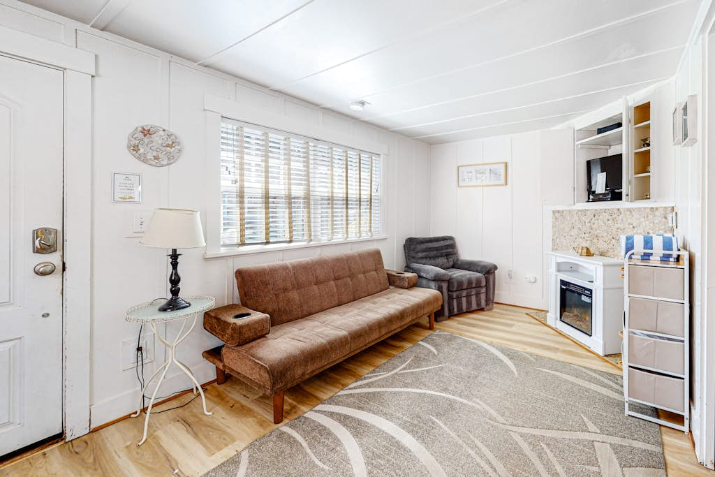 Colorful, Dog-Friendly Cottage with Free WiFi, Fireplace - Near Beach & Town