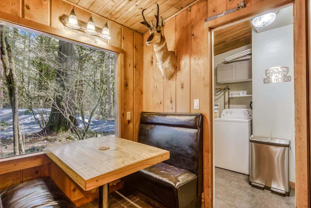 Rustic lodge with private hot tub, fireplace & riverfront views  - dog-friendly