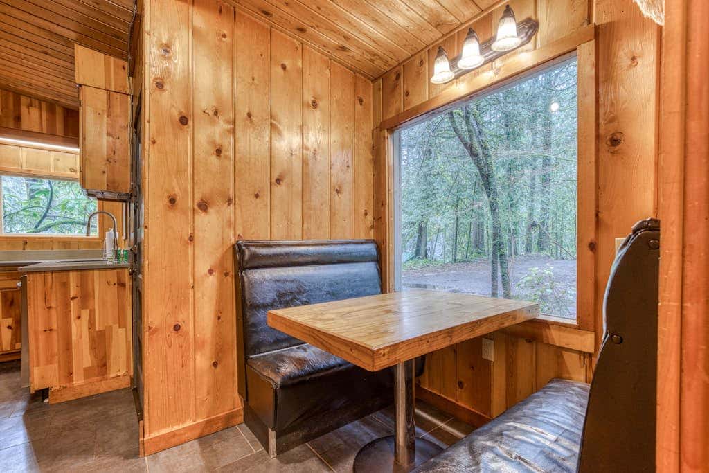 Rustic lodge with private hot tub, fireplace & riverfront views  - dog-friendly