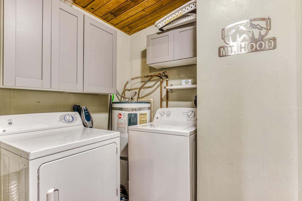 Rustic lodge with private hot tub, fireplace & riverfront views  - dog-friendly