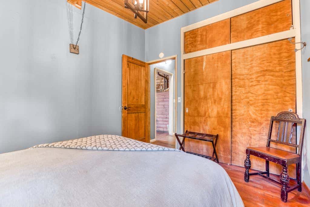 Rustic lodge with private hot tub, fireplace & riverfront views  - dog-friendly