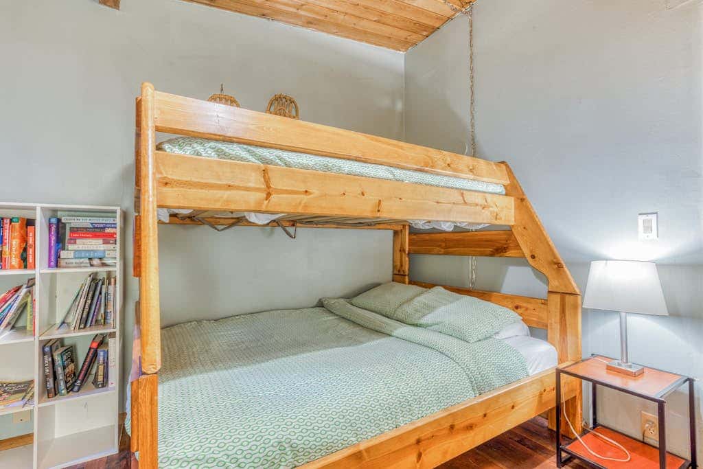 Rustic lodge with private hot tub, fireplace & riverfront views  - dog-friendly