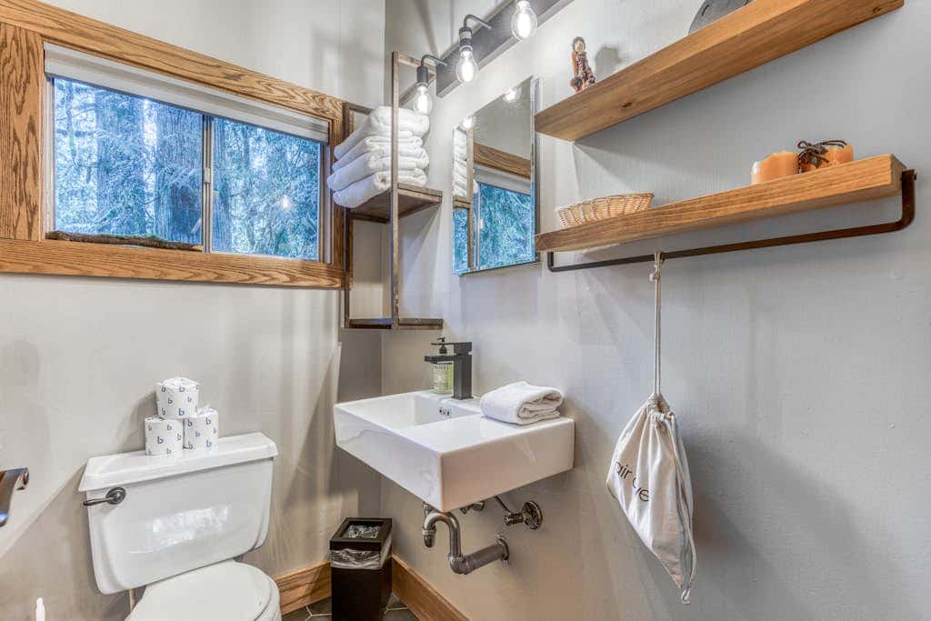Rustic lodge with private hot tub, fireplace & riverfront views  - dog-friendly