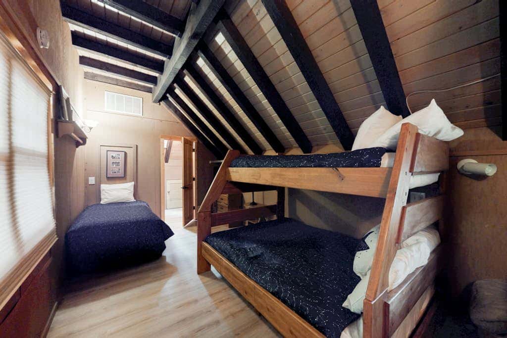 Cabin-style home with hot tub, SHARC passes, central location near skiing & golf