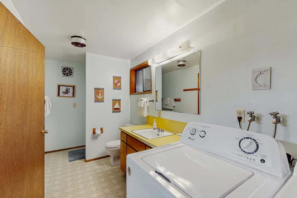 Dog-friendly lakefront home w/ convenient location & private deck