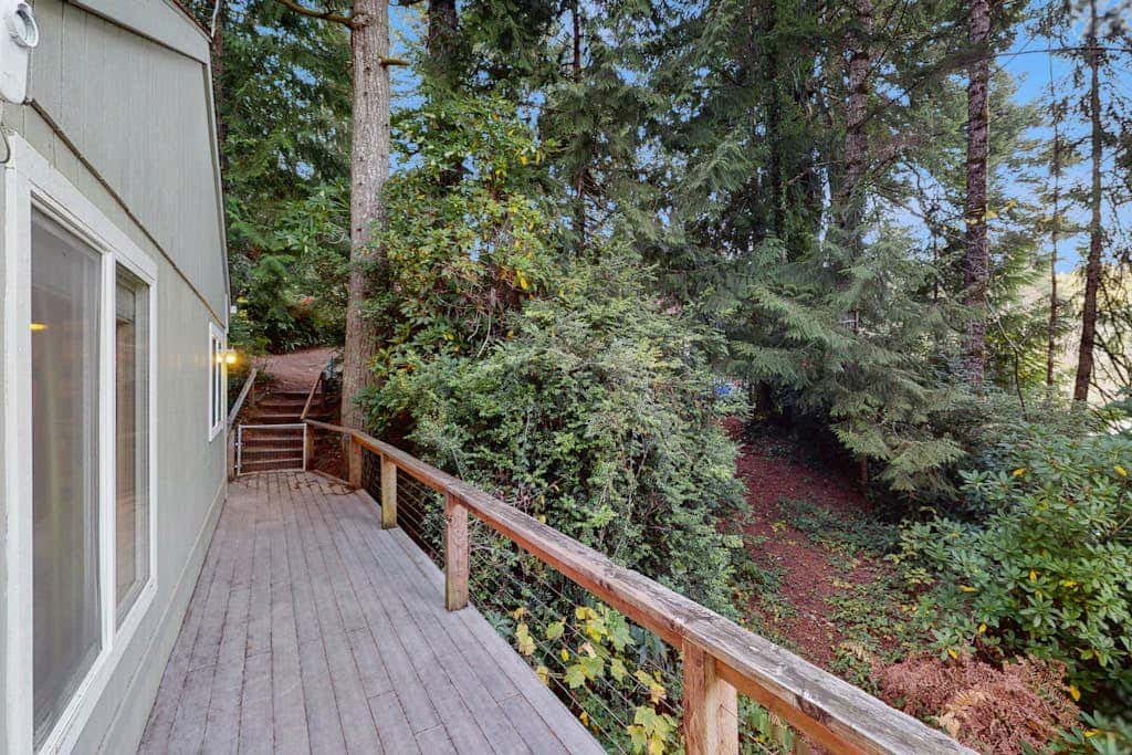 Dog-friendly lakefront home w/ convenient location & private deck