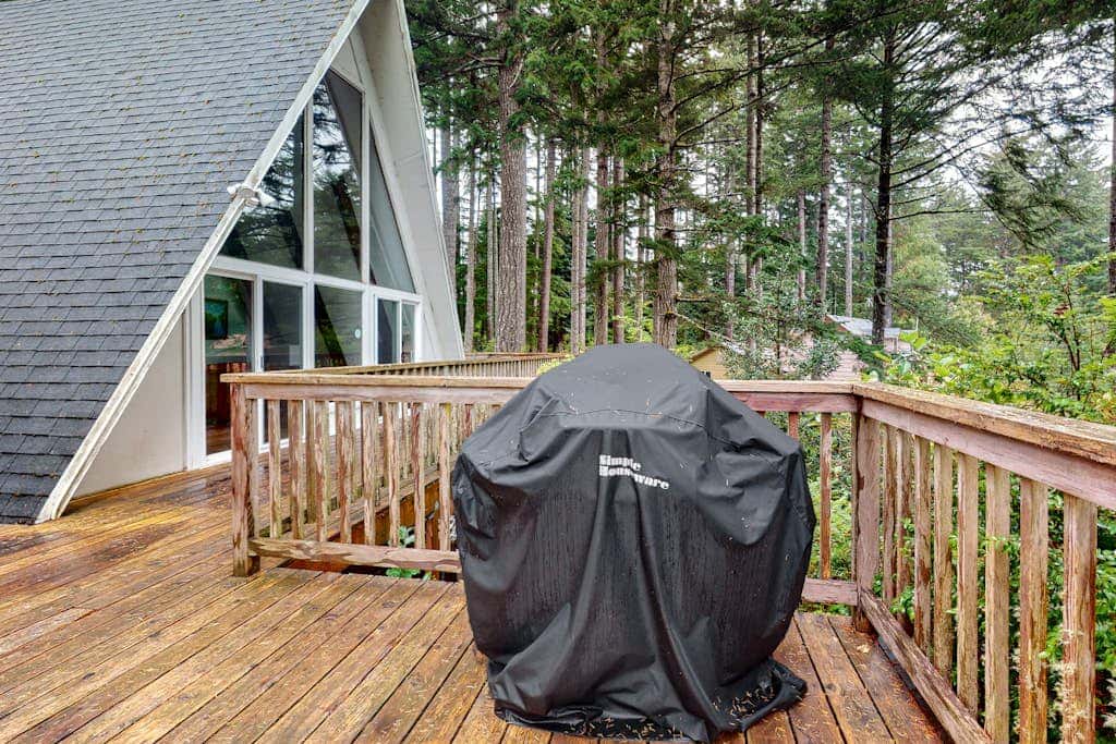 Dog-Friendly Home with Expansive Deck with Hot Tub and Dock on Woahink Lake