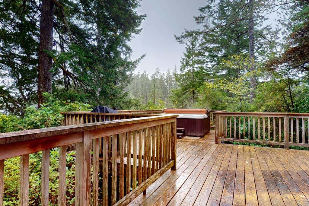 Dog-Friendly Home with Expansive Deck with Hot Tub and Dock on Woahink Lake