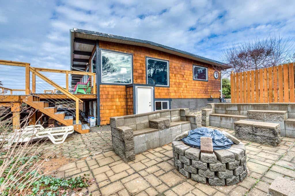 Dog-Friendly, Oceanfront Home with a Private Hot Tub, Firepit, & Free WiFi