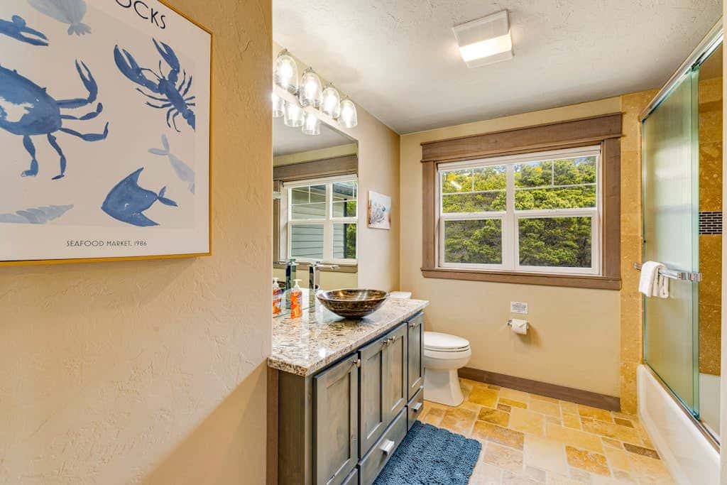 Luxurious home with 3 suites, 3 fireplaces, game room & hot tub - walk to beach