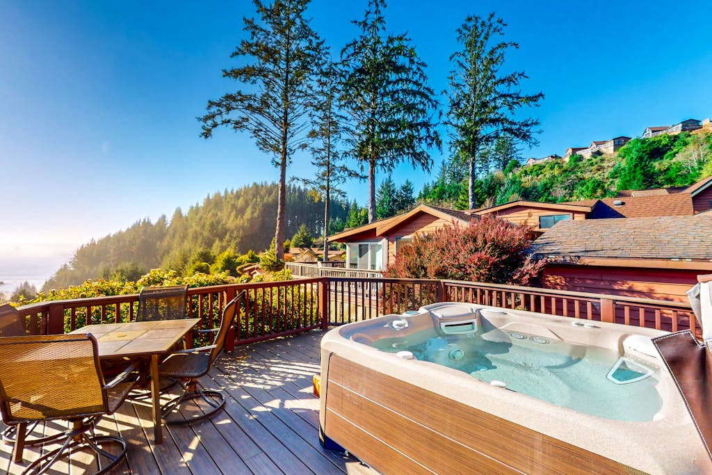 Tranquil dog-friendly coastal escape with private hot tub, patio, & nature views