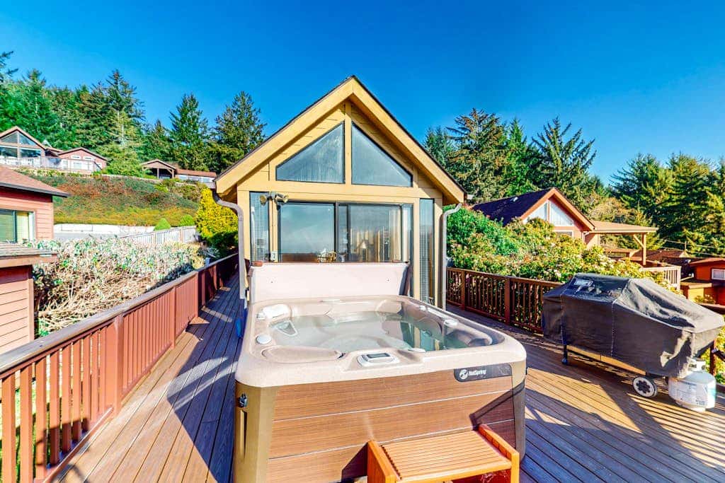 Tranquil dog-friendly coastal escape with private hot tub, patio, & nature views