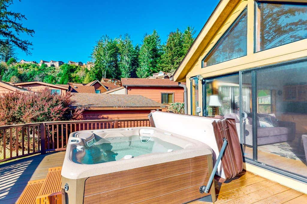Tranquil dog-friendly coastal escape with private hot tub, patio, & nature views