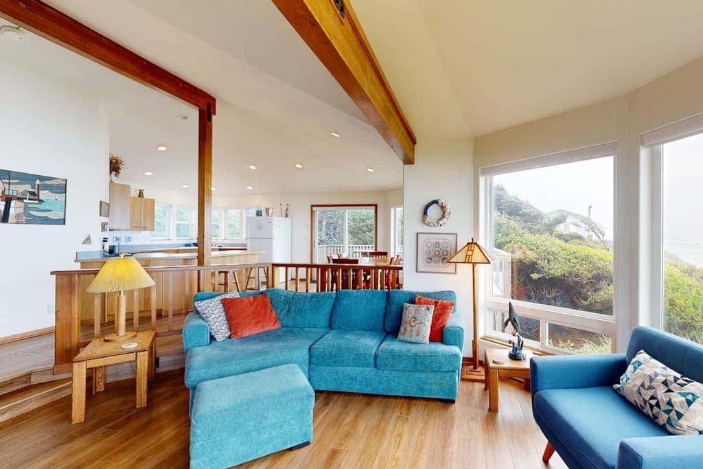 Stunning beachfront home with sweeping ocean views, firepit, fireplace, balcony