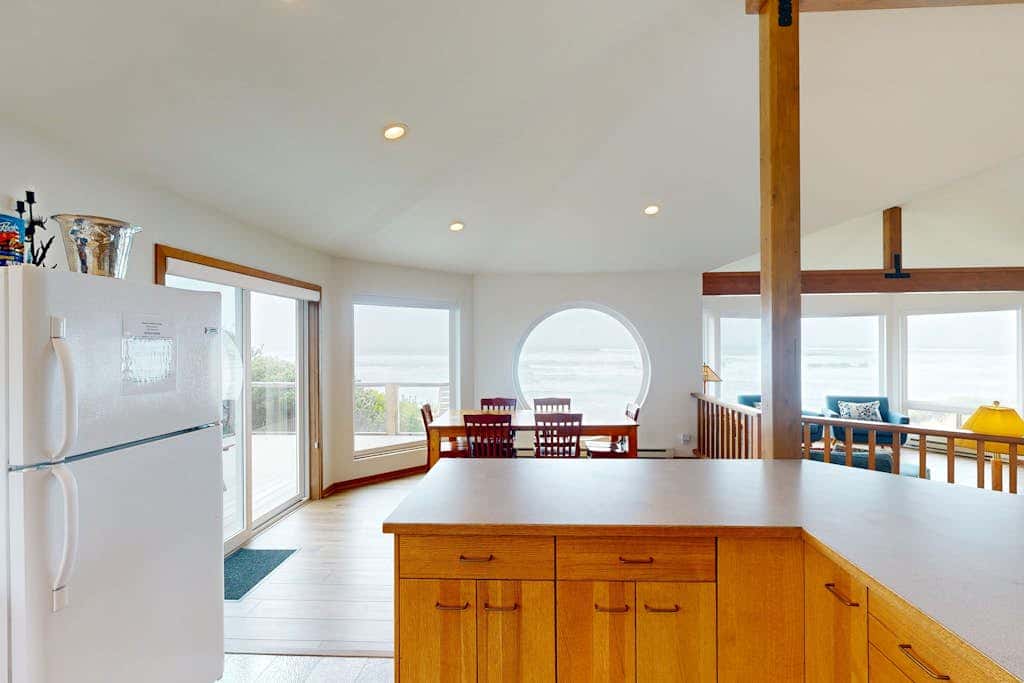Stunning beachfront home with sweeping ocean views, firepit, fireplace, balcony
