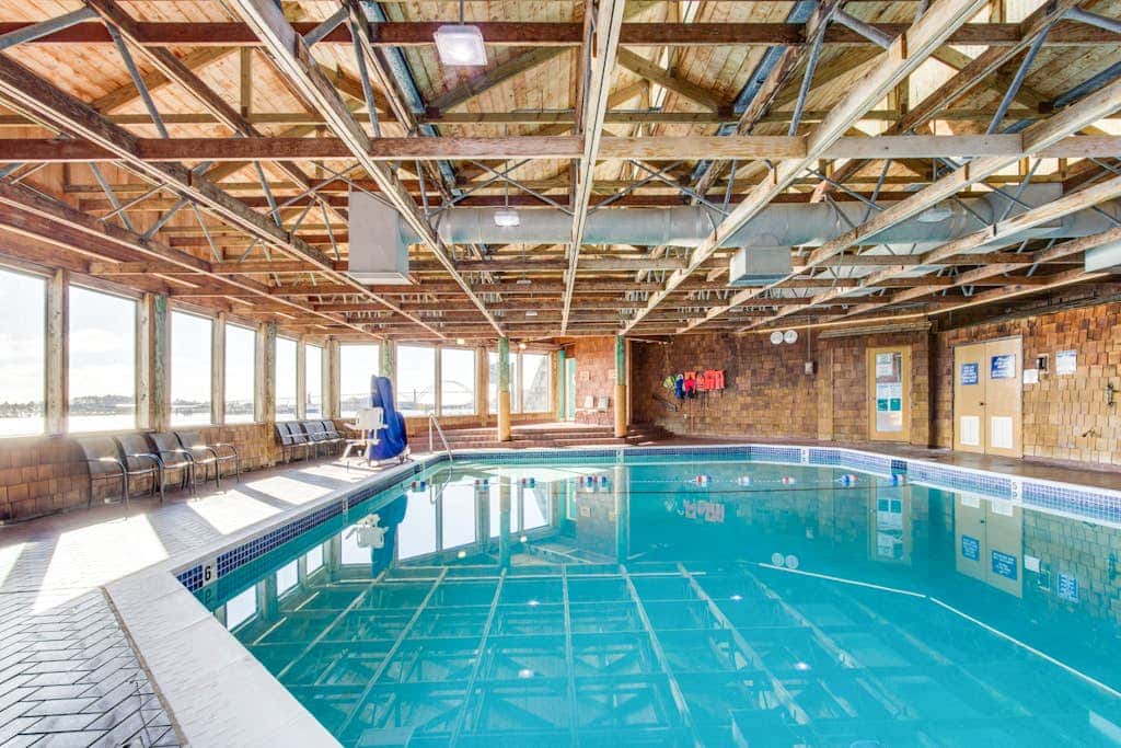 Waterfront Condo with Private Deck, Bay Views, Pool, Hot Tub, & Sauna