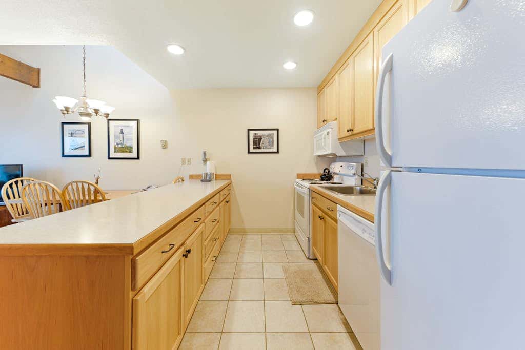 Waterfront Condo with Private Deck, Bay Views, Pool, Hot Tub, & Sauna