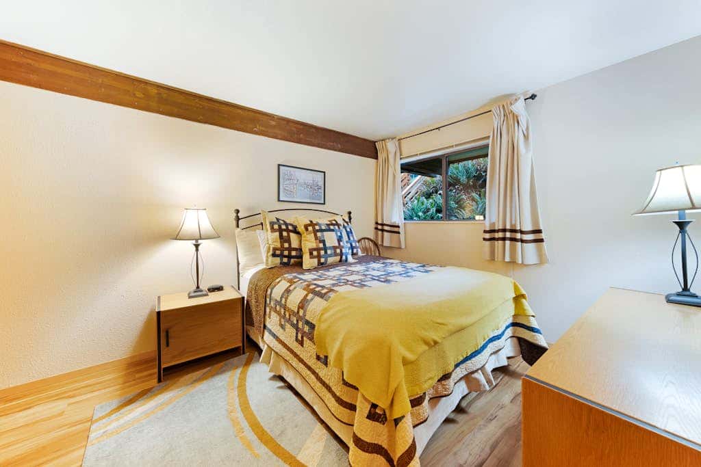 Waterfront Condo with Private Deck, Bay Views, Pool, Hot Tub, & Sauna